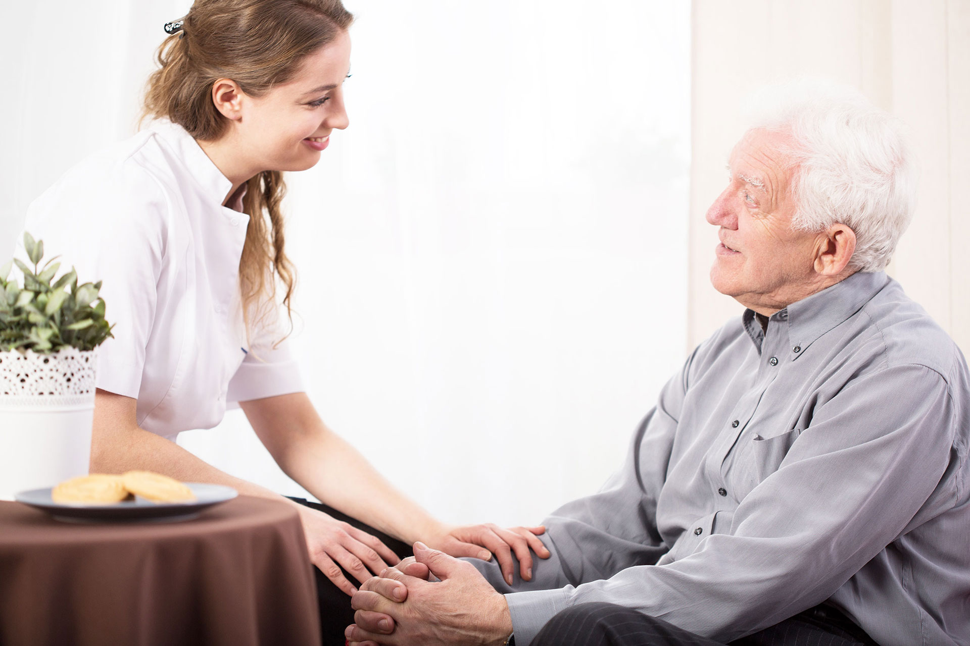 home carer with elderly man