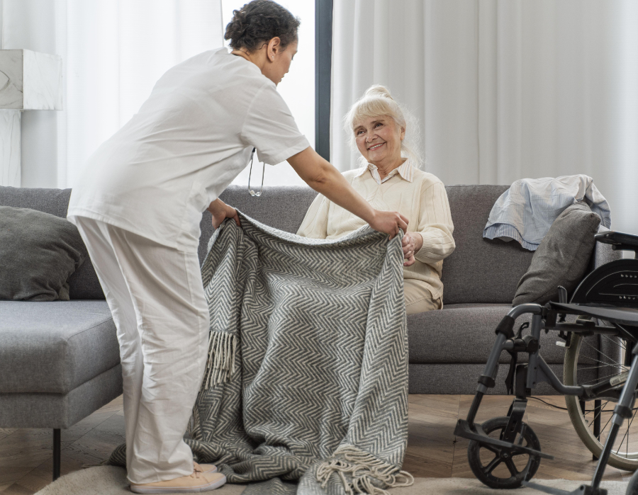 home carer with woman in wheelchair