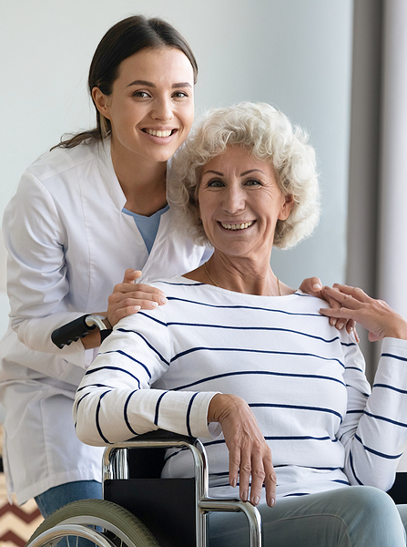 home carer with woman in wheelchair